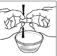 Use your thumb and index finger to pinch near the end of  the overlapping part of the SUSTIVA 200mg capsule - Illustration