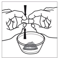 Use your thumb and index finger to pinch near the end of  the overlapping part of the SUSTIVA 600mg capsule - Illustration